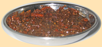 A bowl of Tamarind carrot chutney